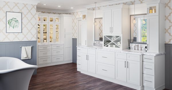 Large bathroom with white cabinetry.