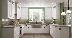 U-shaped kitchen with white cabinets and green accents.
