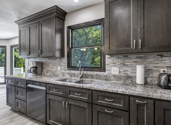 Kitchen with a wall of Florence Slate Shaker cabinets.
