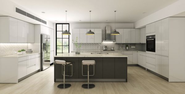 Large kitchen with white cabinetry and dark island.