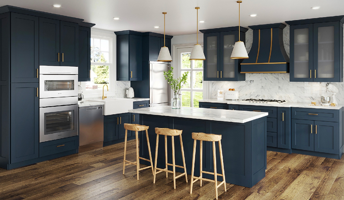 Midnight Blue shaker cabinets on the island with dark wood cabinets on the perimeter.