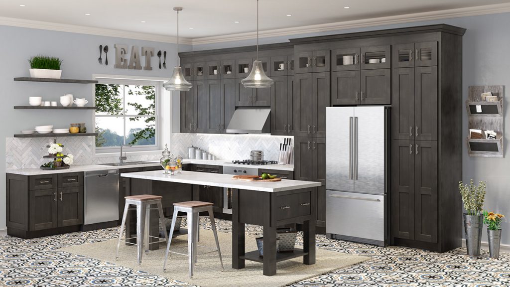 Rustic kitchen with dark gray cabinets and chrome appliances.