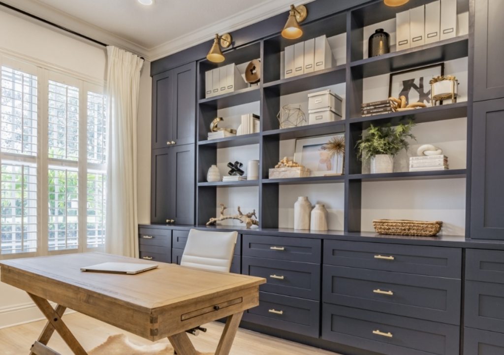 Cabinets against a wall creating an office.