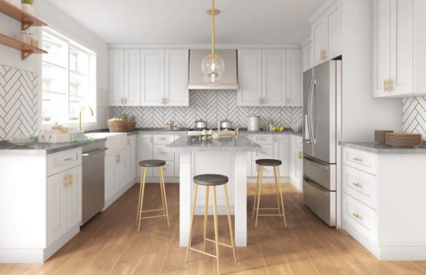 Bright white kitchen with light wood floors.