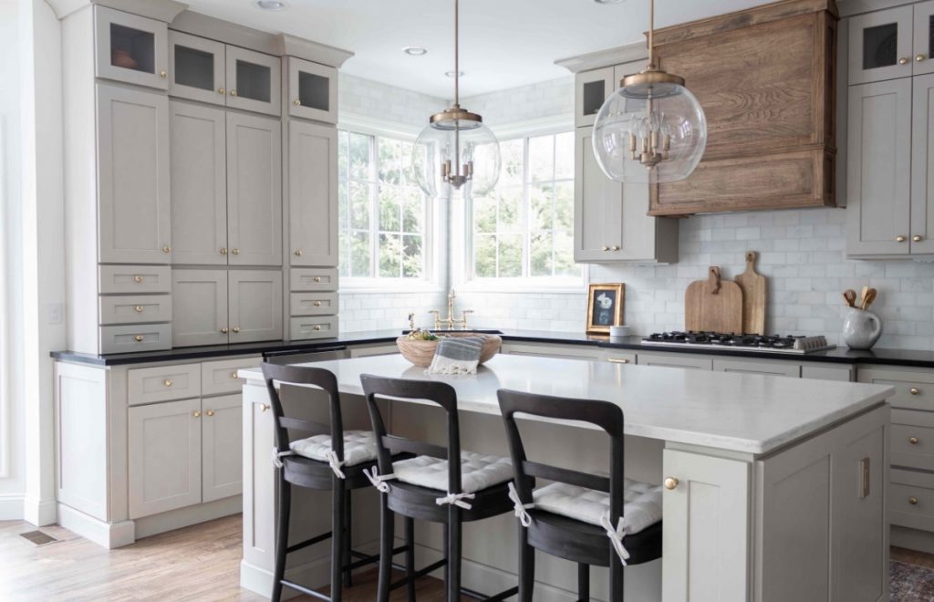 Large open kitchen with taupe cabinets and large kitchen island.