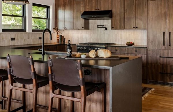 Cozy kitchen with wood cabinets and accents.