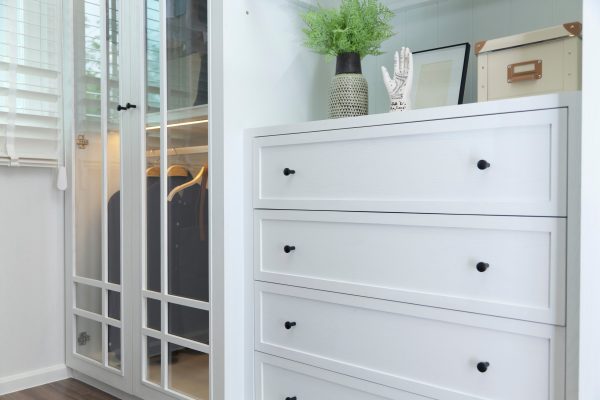 Close up of cabinets in a closet.