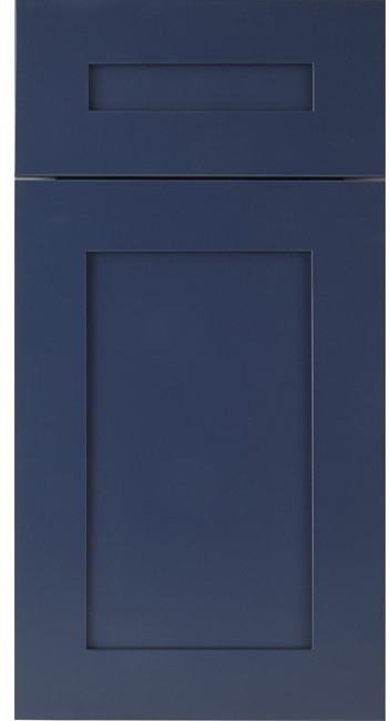 Double vanity bathroom setup with navy cabinets, white marble top, brass hardware, gold framed mirrors, and white toilet.